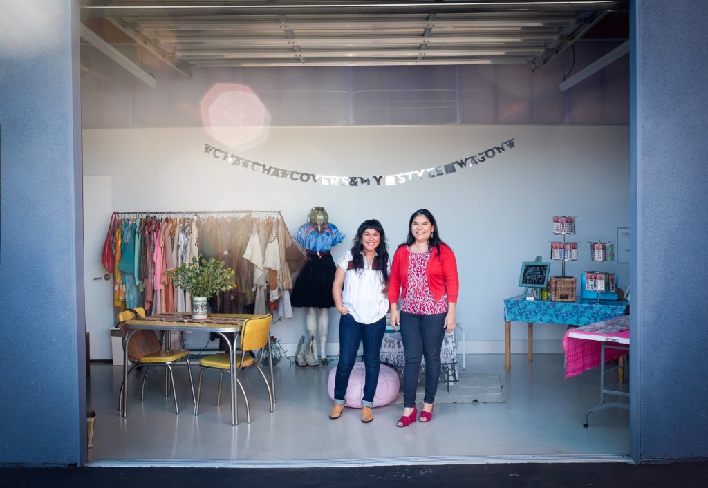 Photograph by Natalie Kamajian of ¡Artistas y Empresarios!, recipients of the Creative Economic Development Fund, at their storefront in Boyle Heights. Courtesy of the Leadership Urban Renewal Network.
