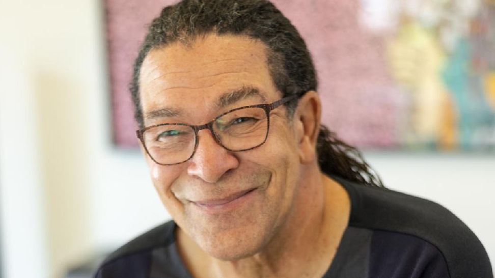 An image of Artist Mark Steven Greenfield wearing glasses and smiling.